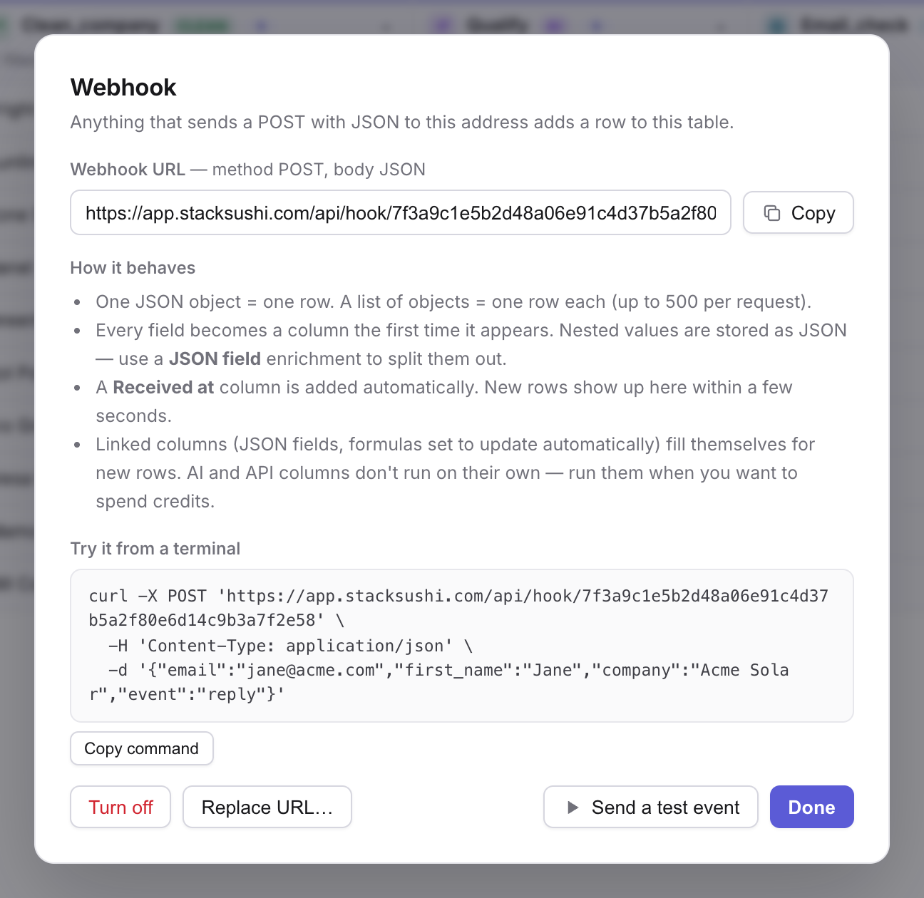 The webhook dialog with the table's private URL and a test command
